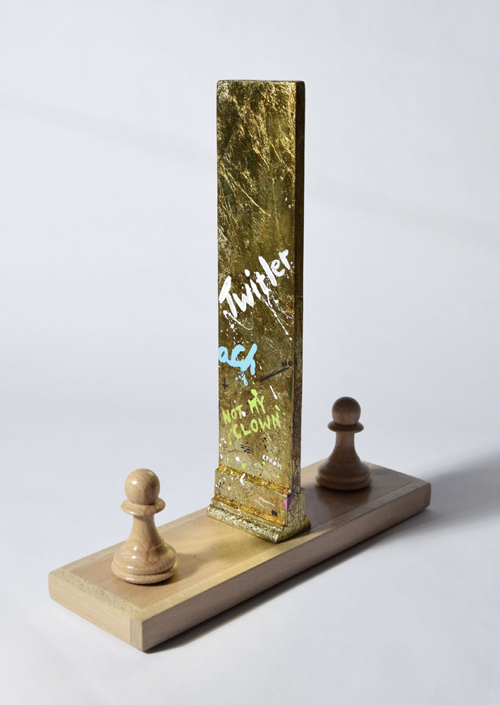 Sculpture of Chess Pawns and Huge Gold Wall by Bourdon Brindille