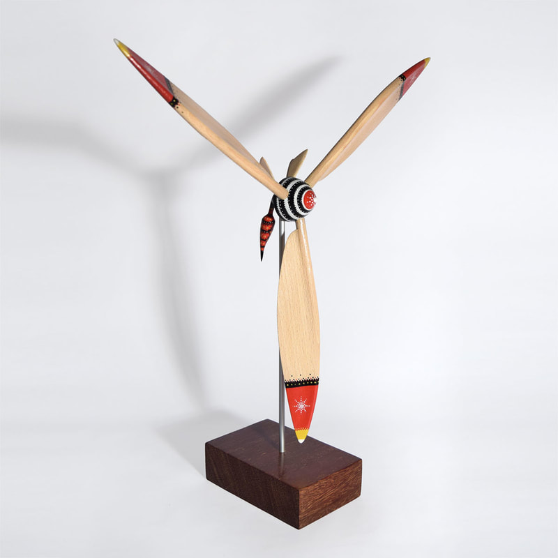 Wooden Sculpture of a Bee with huge propeller by Bourdon Brindille
