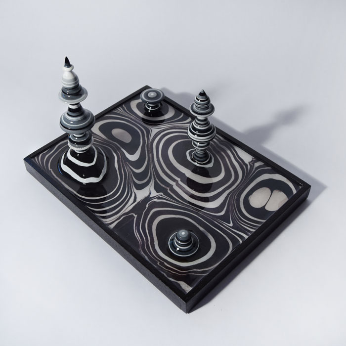 Dissolving Chess Piece Sculpture by Bourdon Brindille