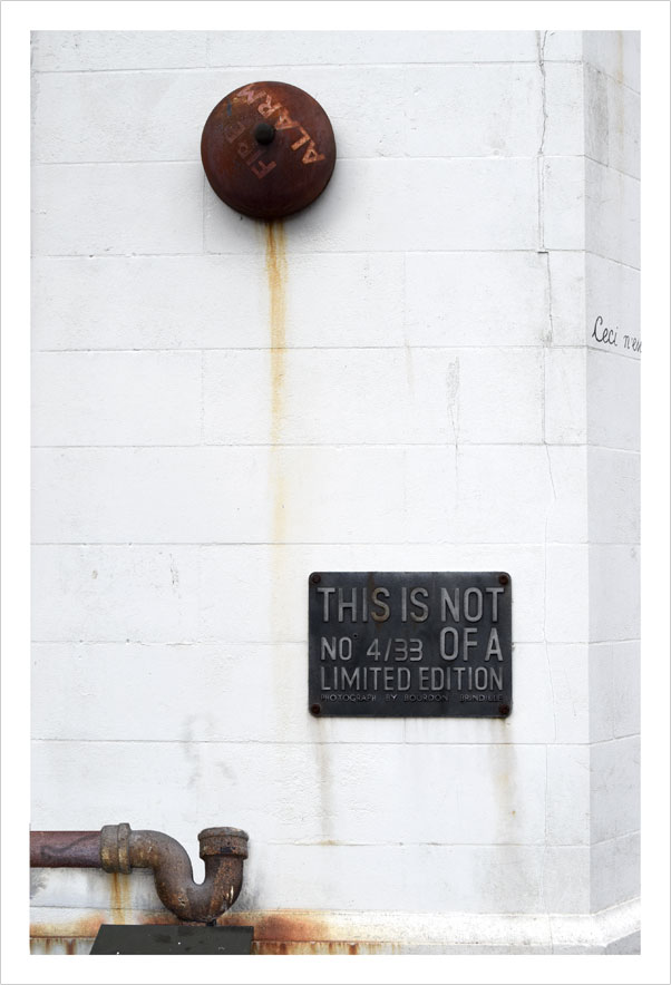 Doctored photograph of rusty fire alarm entitled 'Ode 3' by Bourdon Brindille
